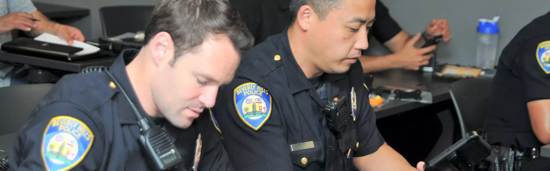 police viewing security footage